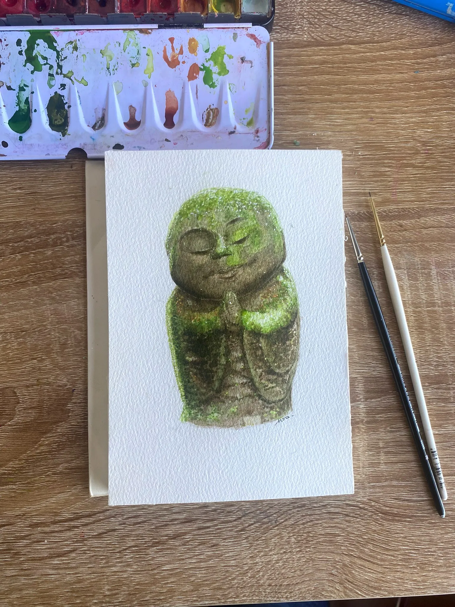 La statue Jizo peinte, sur le papier