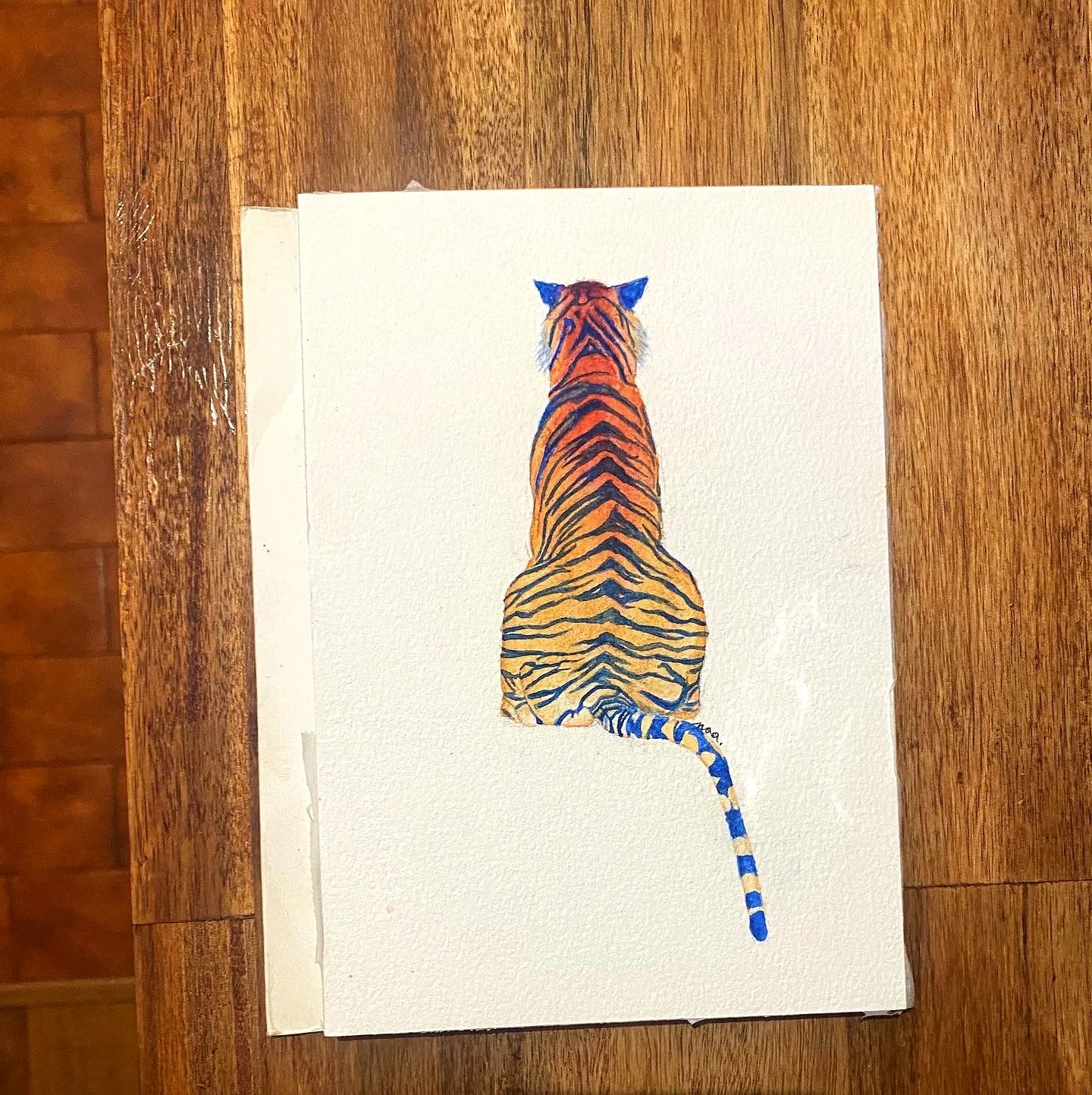 Le tigre peint, sur le papier